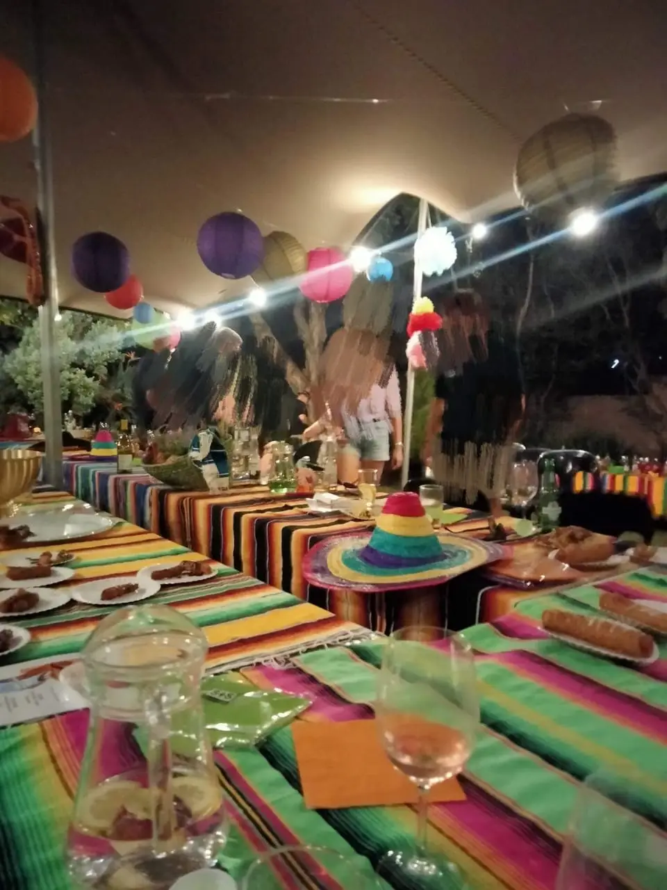 Vibrant table setup with colorful decorations and food