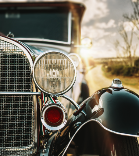 Close-up of a vintage car's front details