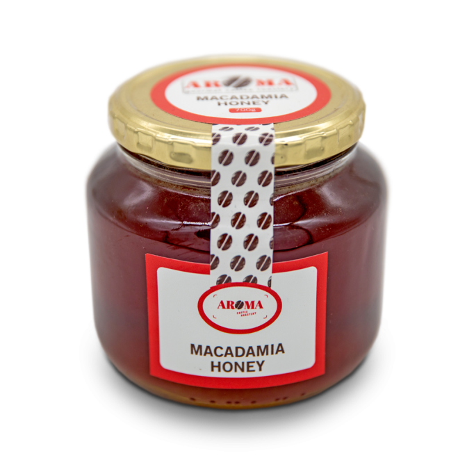 Jar of macadamia honey with label and golden lid