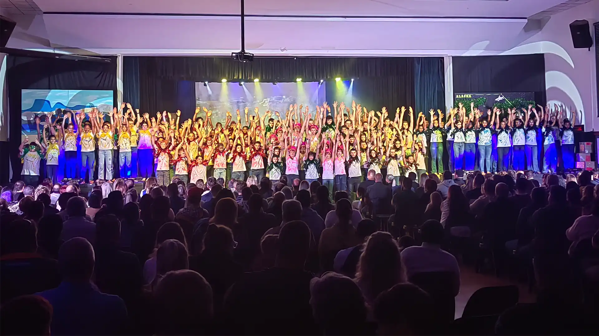 Stage performance with dynamic lights and audience engagement