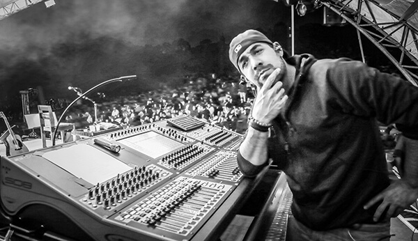 Technician at audio console during a live event