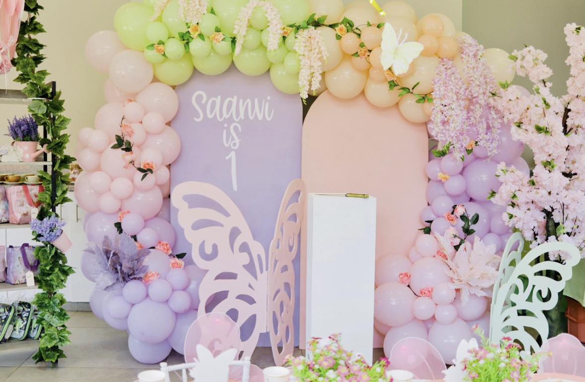 Pastel balloon arch for a child's birthday celebration