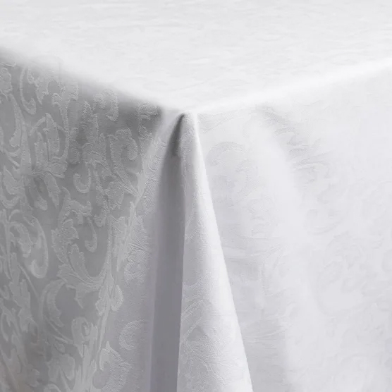 Textured white tablecloth over a table
