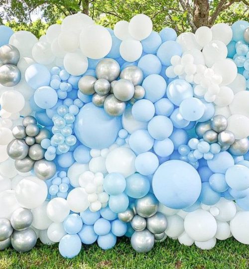 Organic balloon backdrop in blue and silver hues.