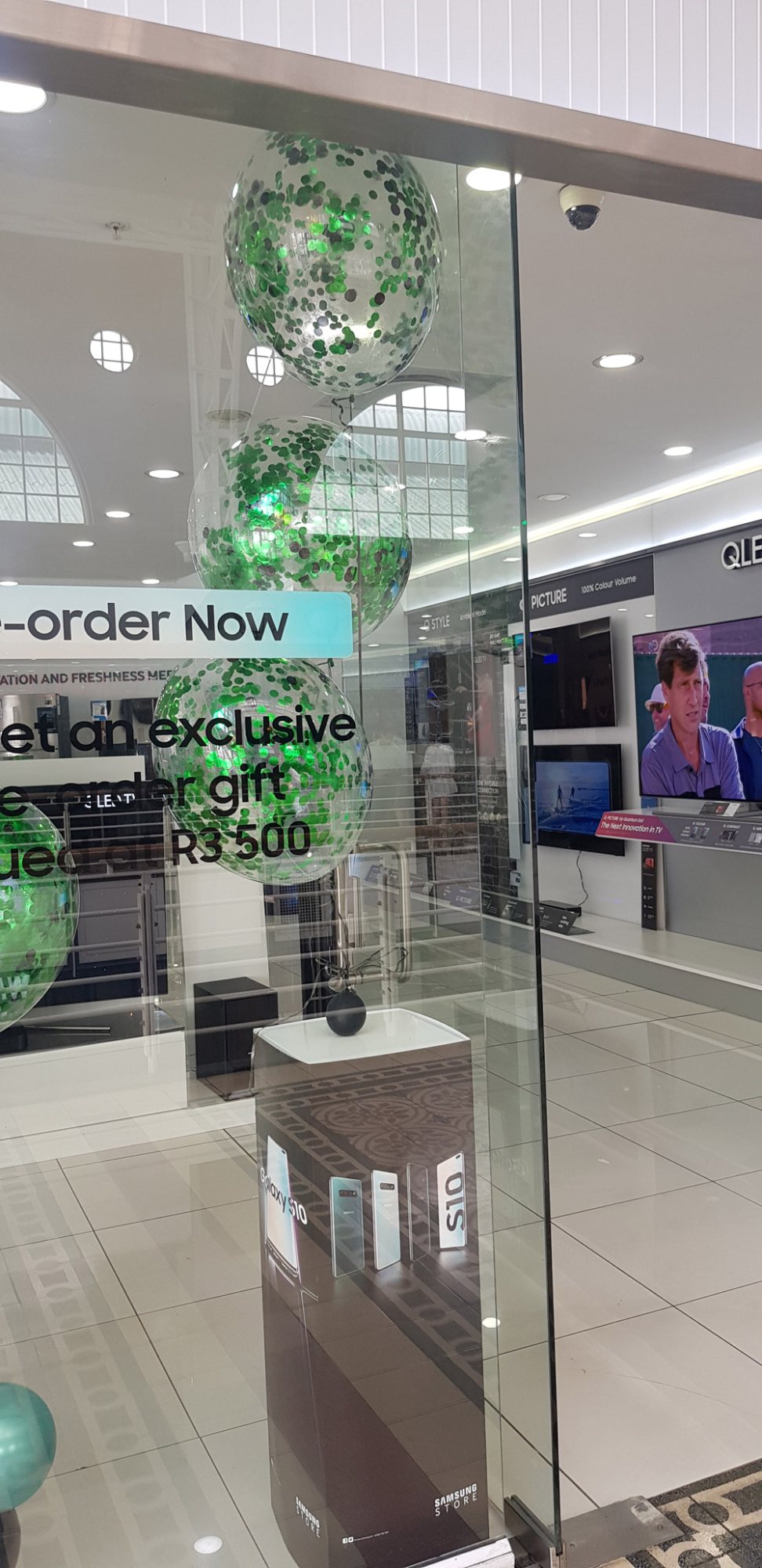 Organic balloons in a retail window display