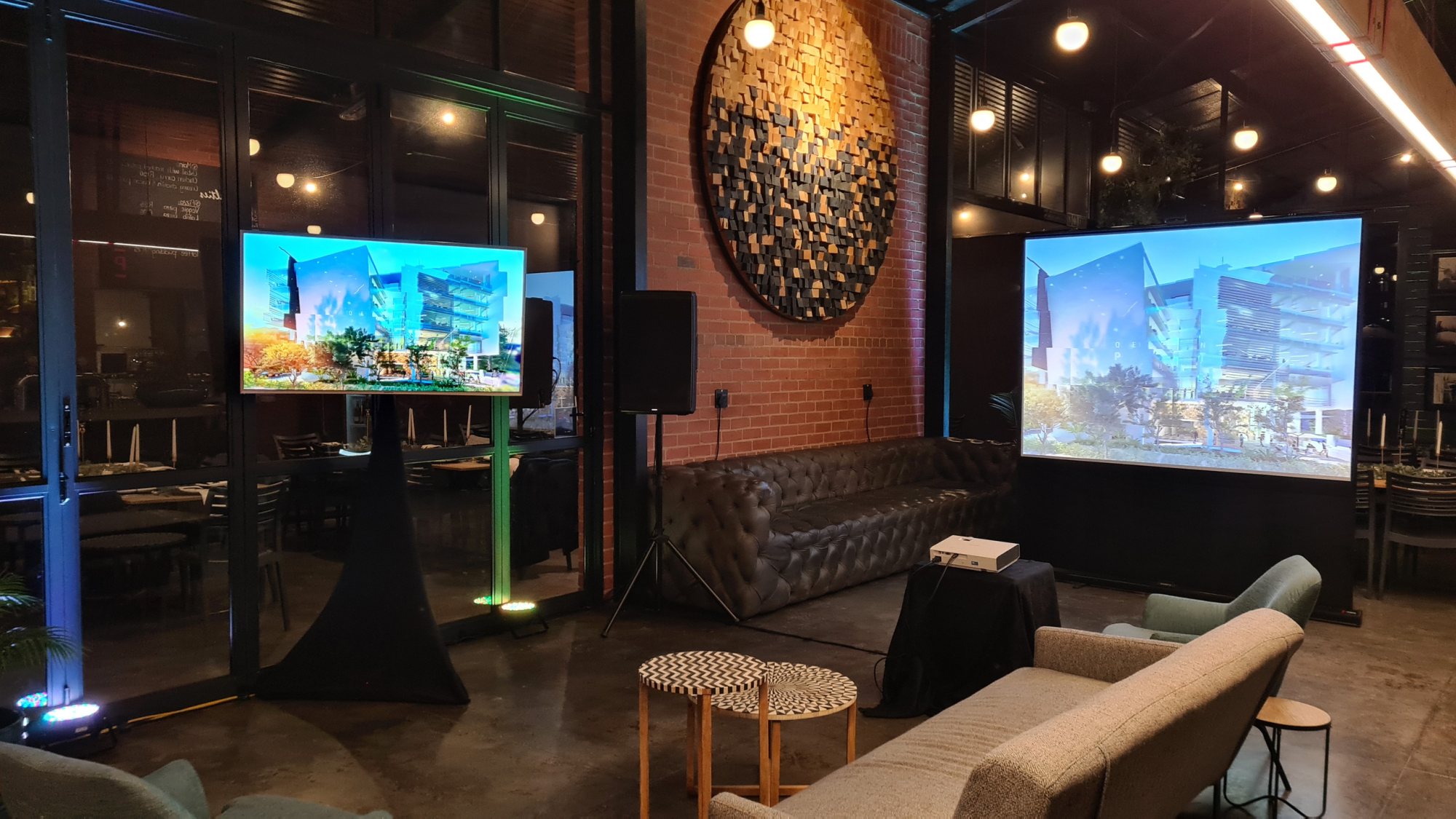 Event space with two projection screens and seating