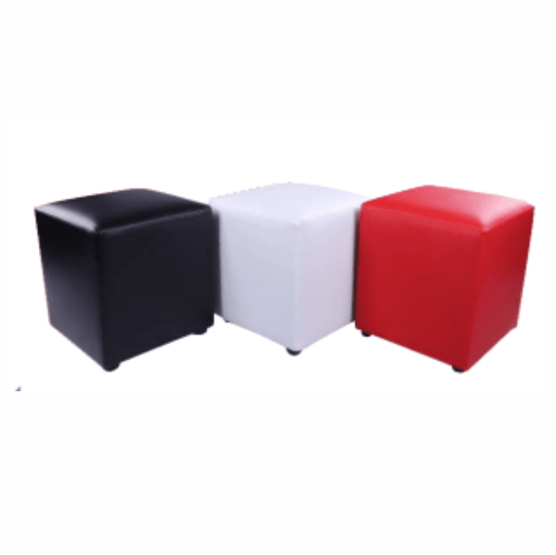 Three colorful cube ottomans in black, white, and red