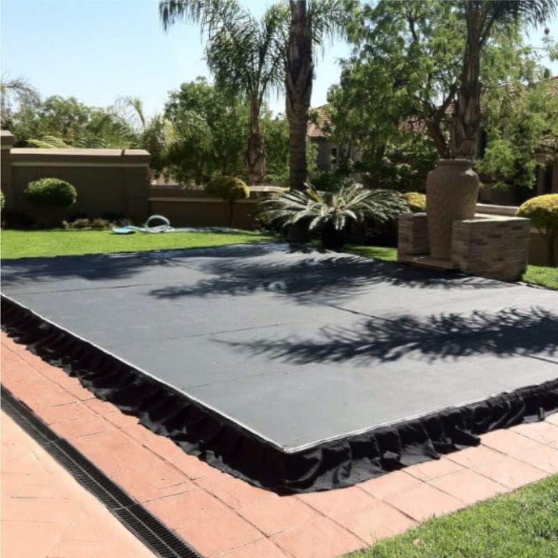 Outdoor event flooring setup in a garden