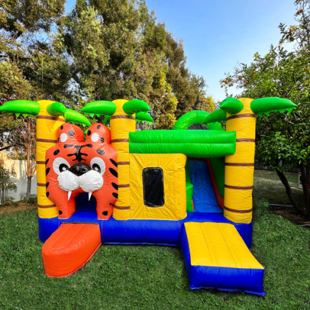 Colorful Jungle Jumper inflatable in a garden setting