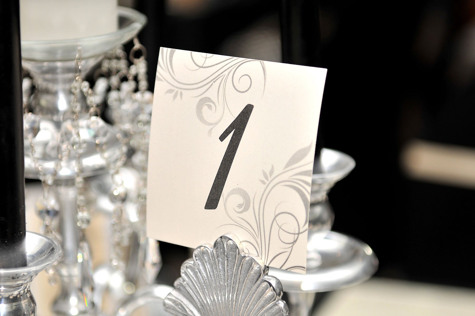 Table number 1 displayed elegantly on a silver holder
