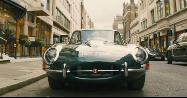 Front view of a vintage car parked on a city street