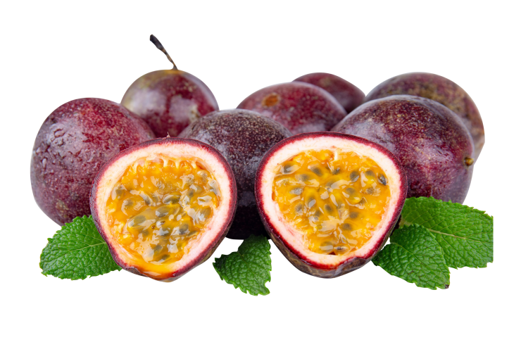 Whole and halved passion fruits with mint leaves
