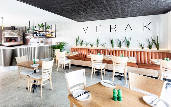 Interior view of Merak restaurant with seating and decor