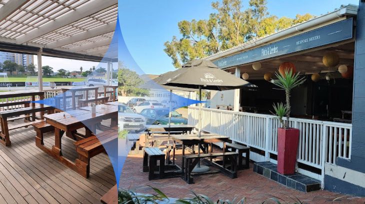 Outdoor seating setup with wooden tables and umbrellas