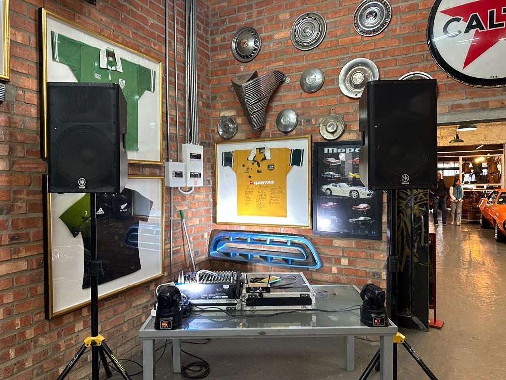 DJ speakers and equipment set up in a venue