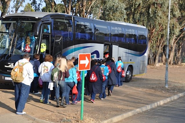 Passengers boarding a luxury bus in Bloemfontein