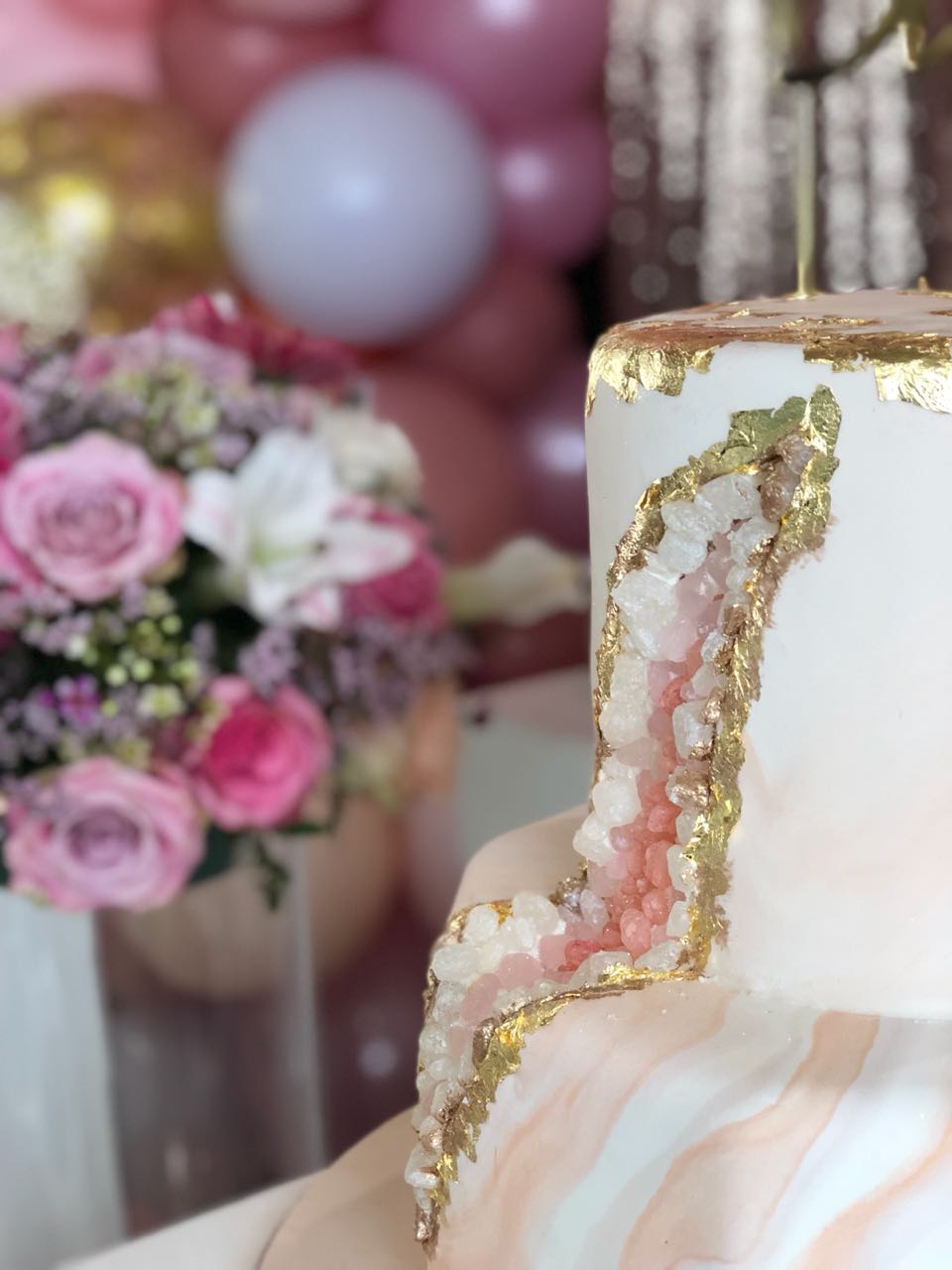 Wedding cake with gold leaf and crystal decoration