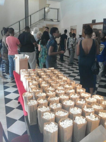 A detailed view of bags filled with popcorn on a table.