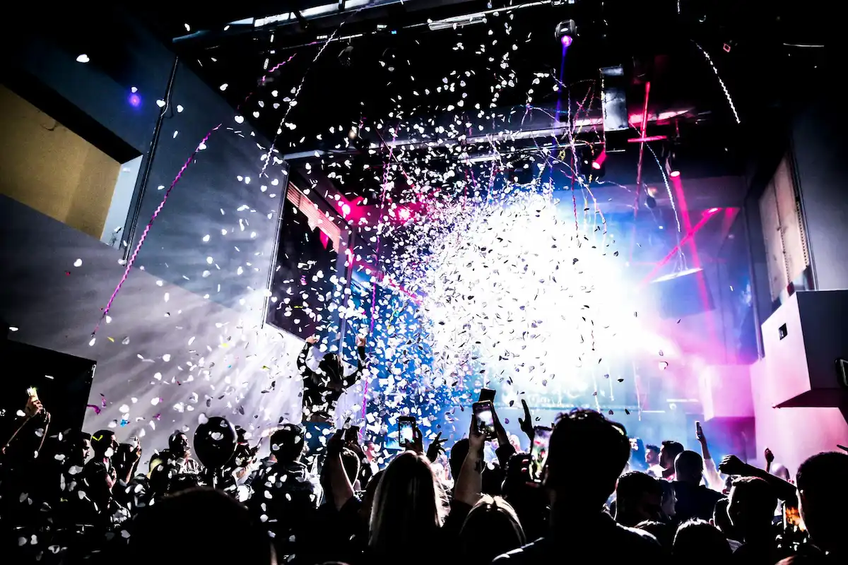 A lively event with confetti and bright lights