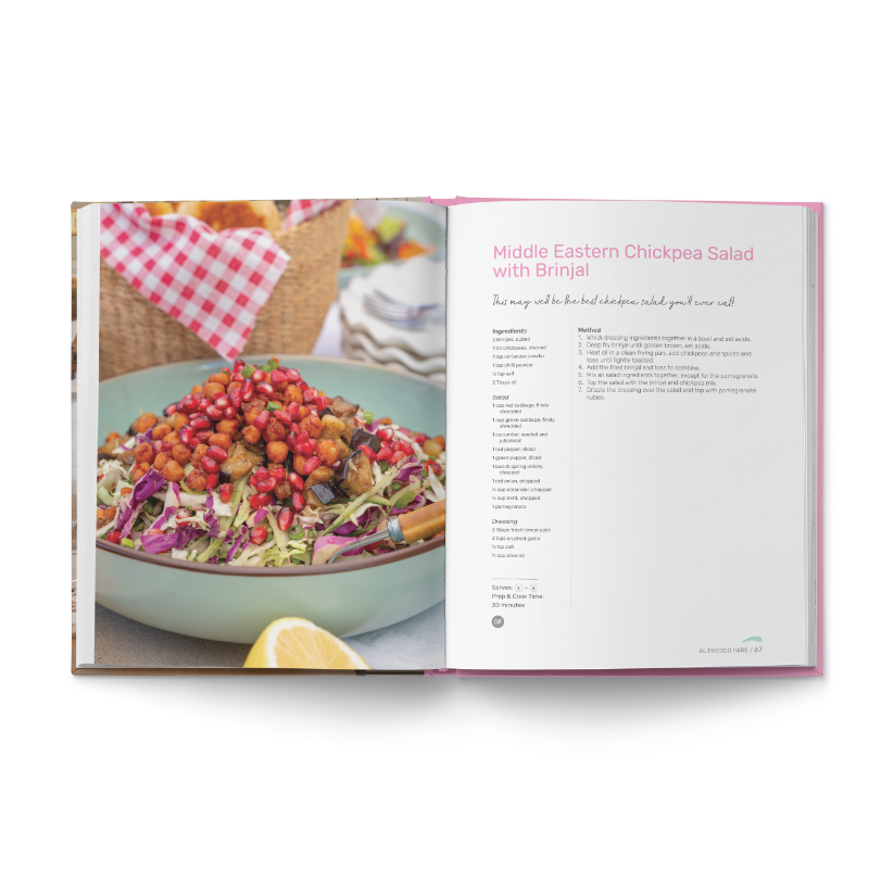 Open recipe book showing Middle Eastern Chickpea Salad with Brinjal