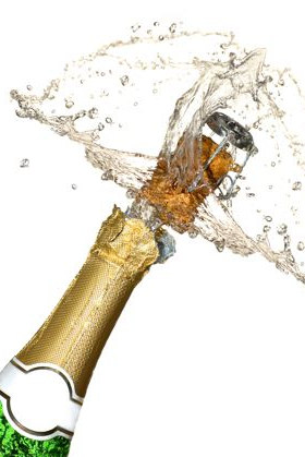 Champagne bottle cork popping with splashing liquid.
