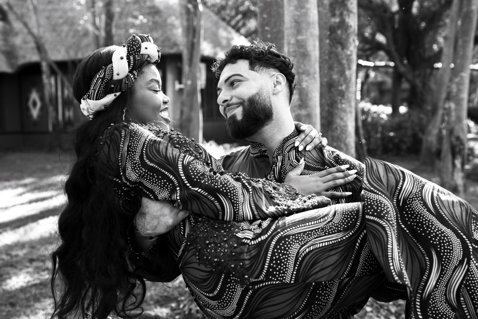 A couple enjoying a moment in a picturesque outdoor setting.