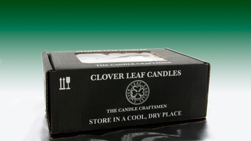 Clover Leaf Candles black packaging with storage instructions.