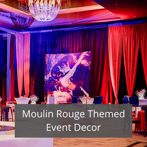 Moulin Rouge themed event decor with red and blue draping