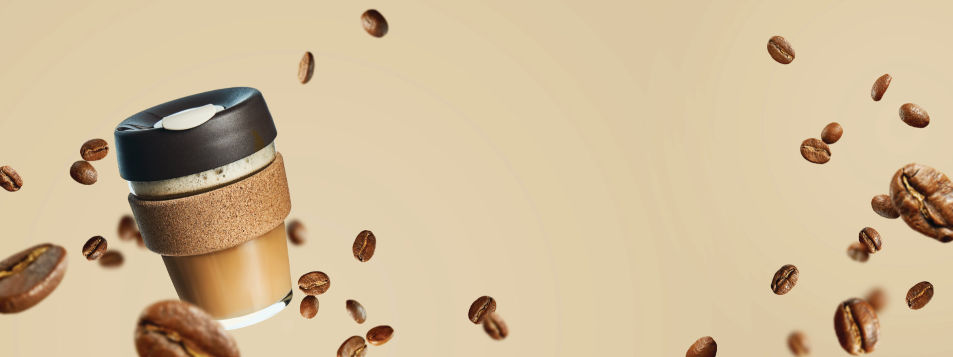 Coffee cup with cork sleeve and coffee beans on beige background