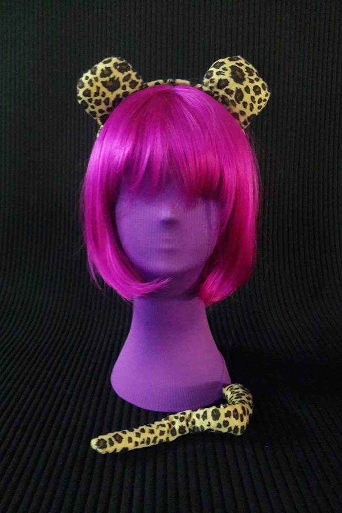 Leopard print headband and tail on a purple mannequin