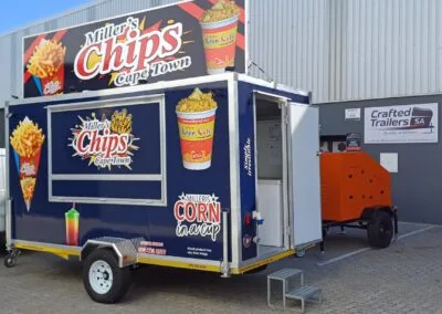 Miller's Chips food trailer with bright branding in outdoor area