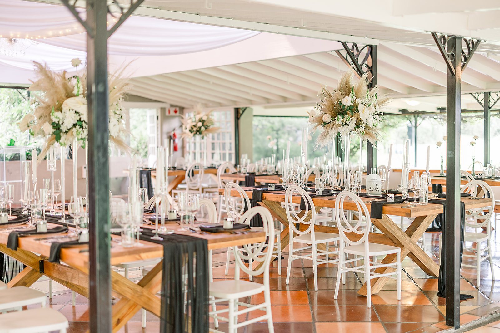 Stylish table setup with floral arrangements and tableware