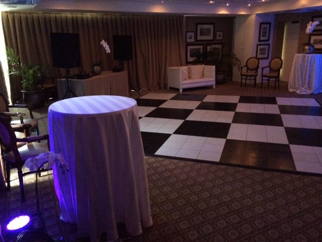 Checkered black and white dance floor in a venue