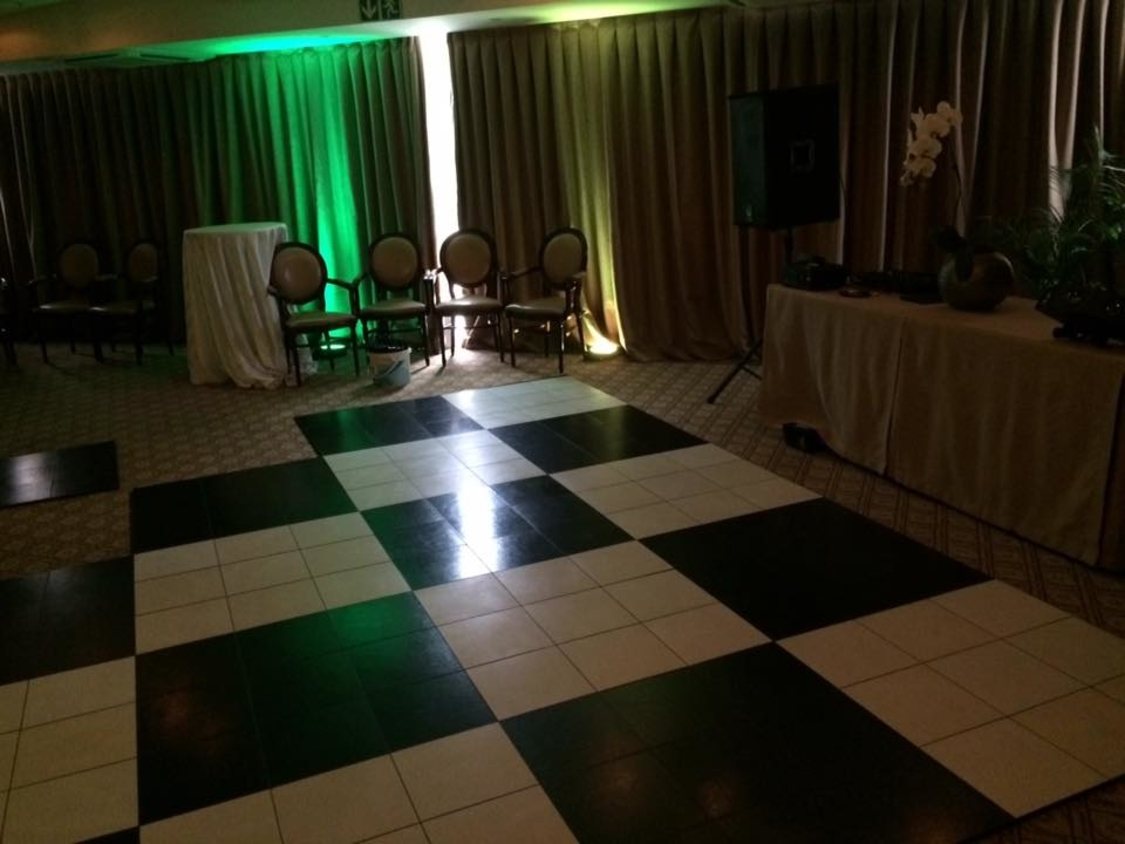 Checkered black and white dance floor in a venue