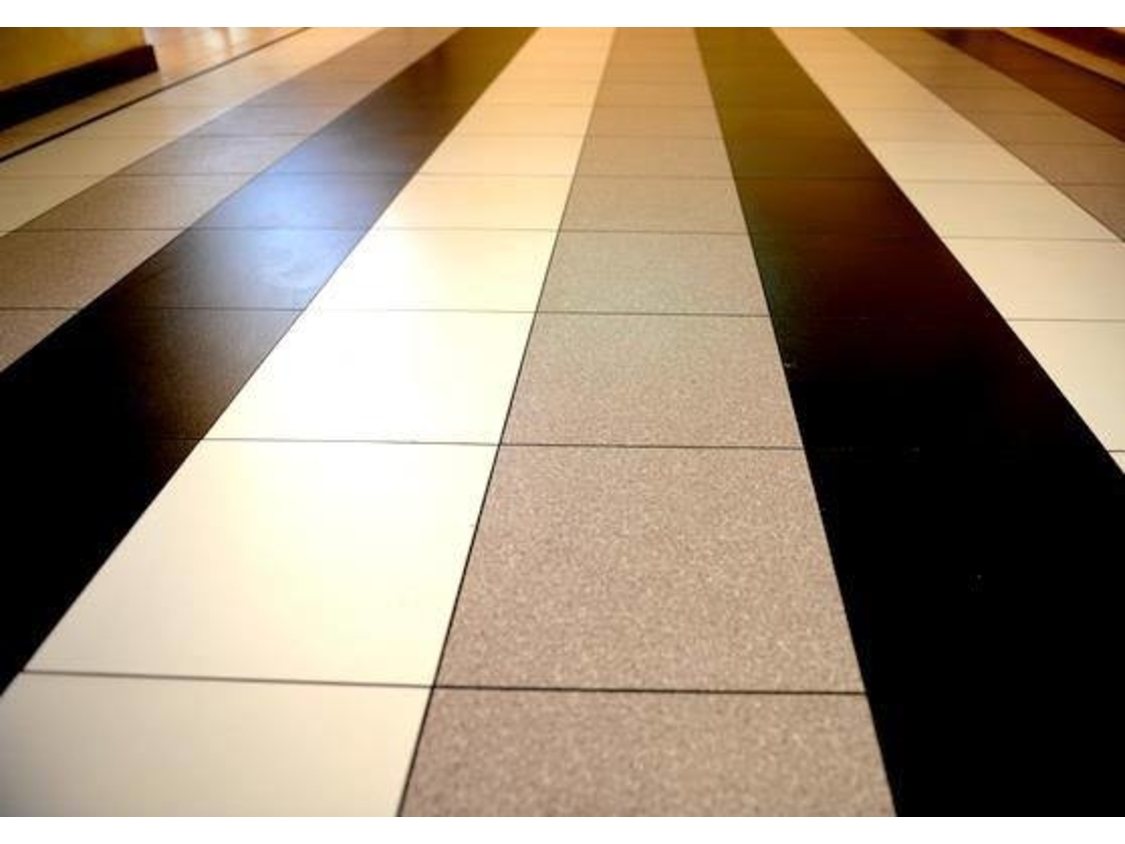 Black and white tiled dance floor with alternating tiles