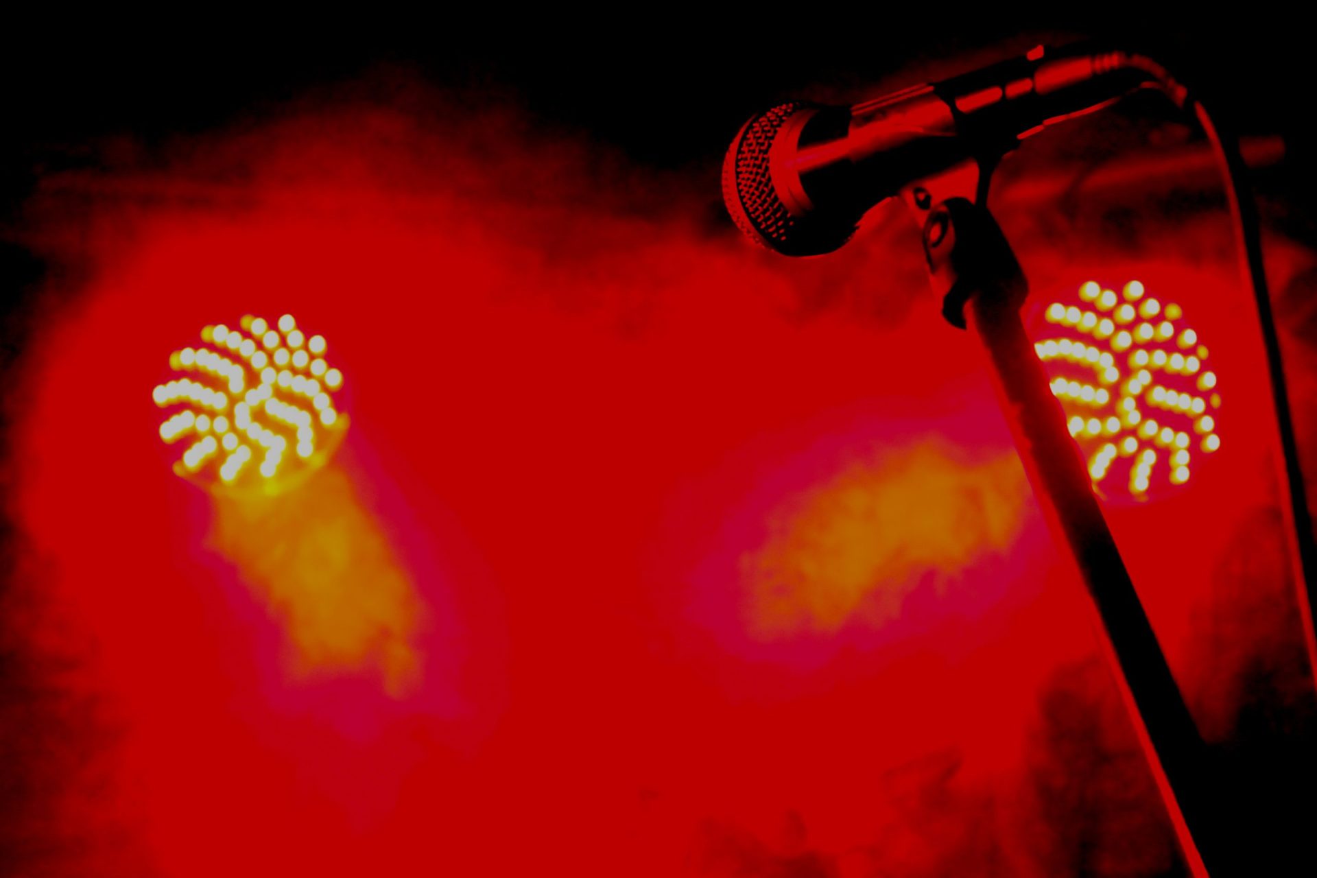 Red uplighting and a microphone