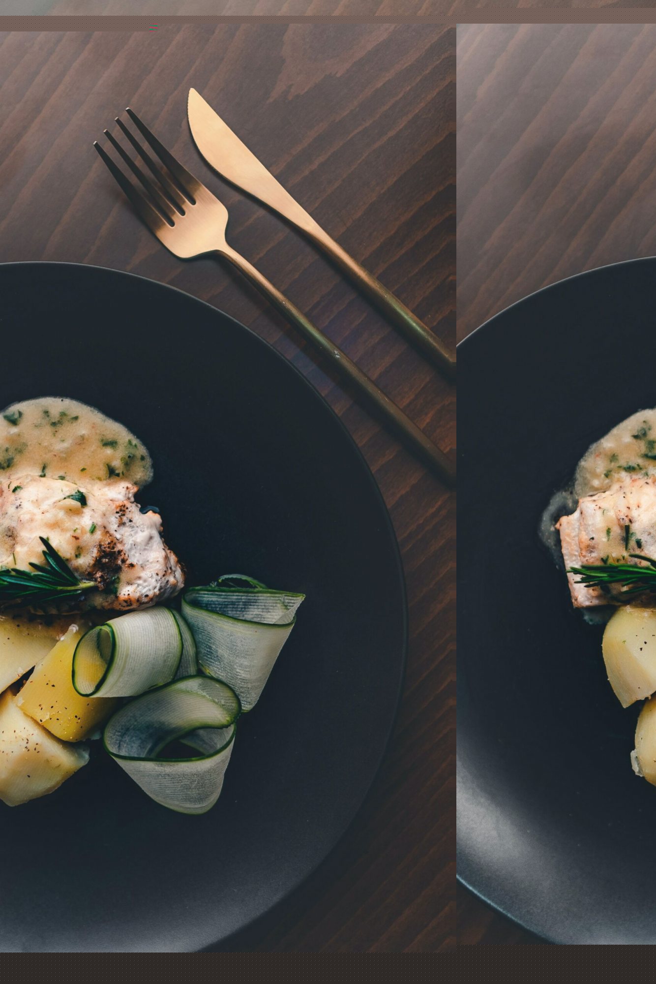 Gourmet salmon fillet with potatoes and cucumber on black plate
