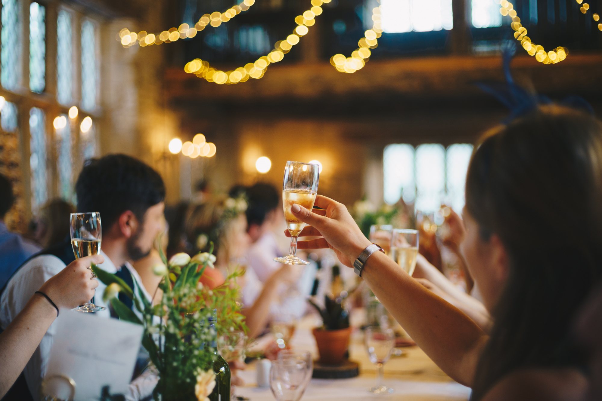 Guests toasting with champagne at a festive event
