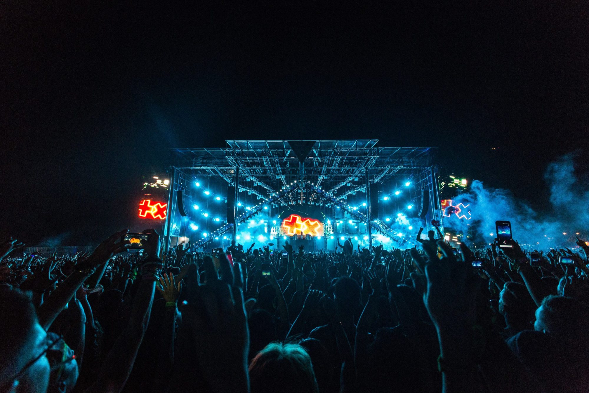Concert stage with dynamic lighting and audience