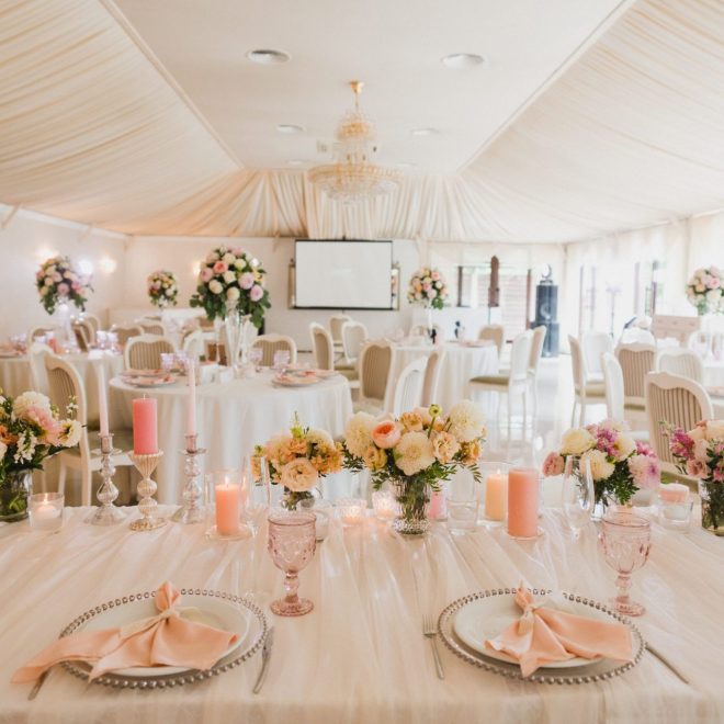 Elegant dining table setup with flowers and candles