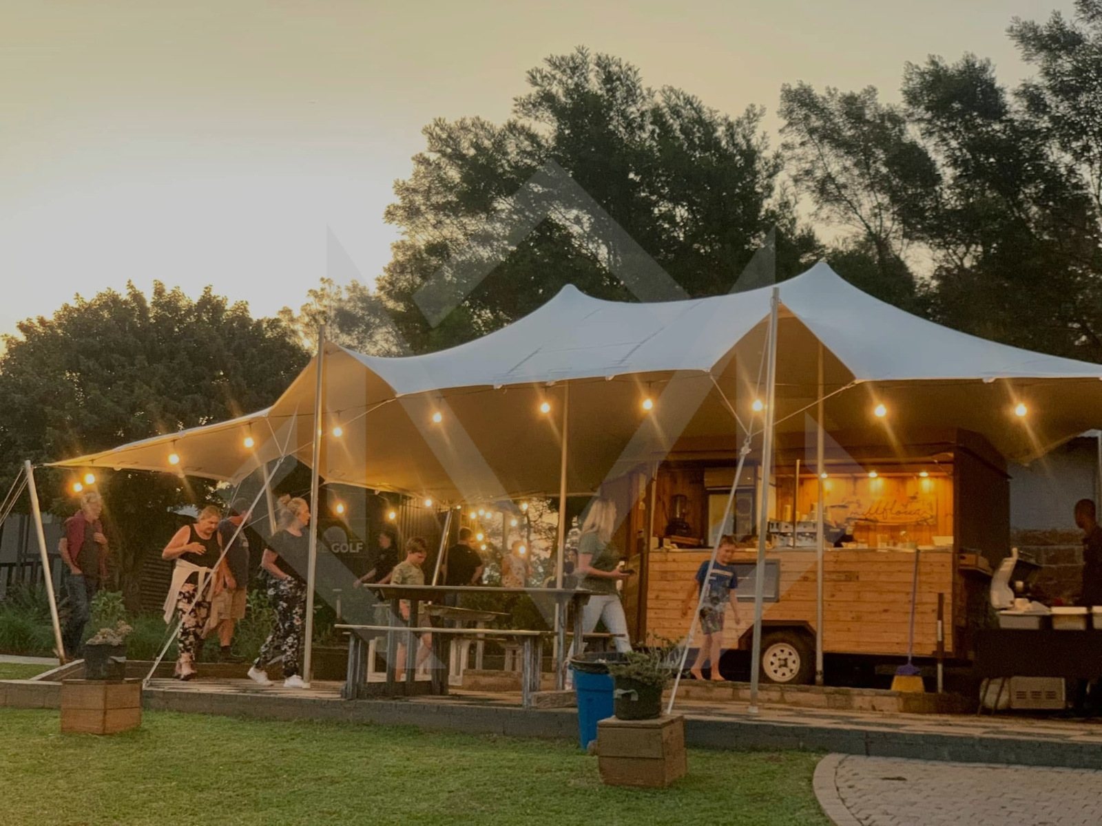 Bedouin stretch tent with lights at outdoor event