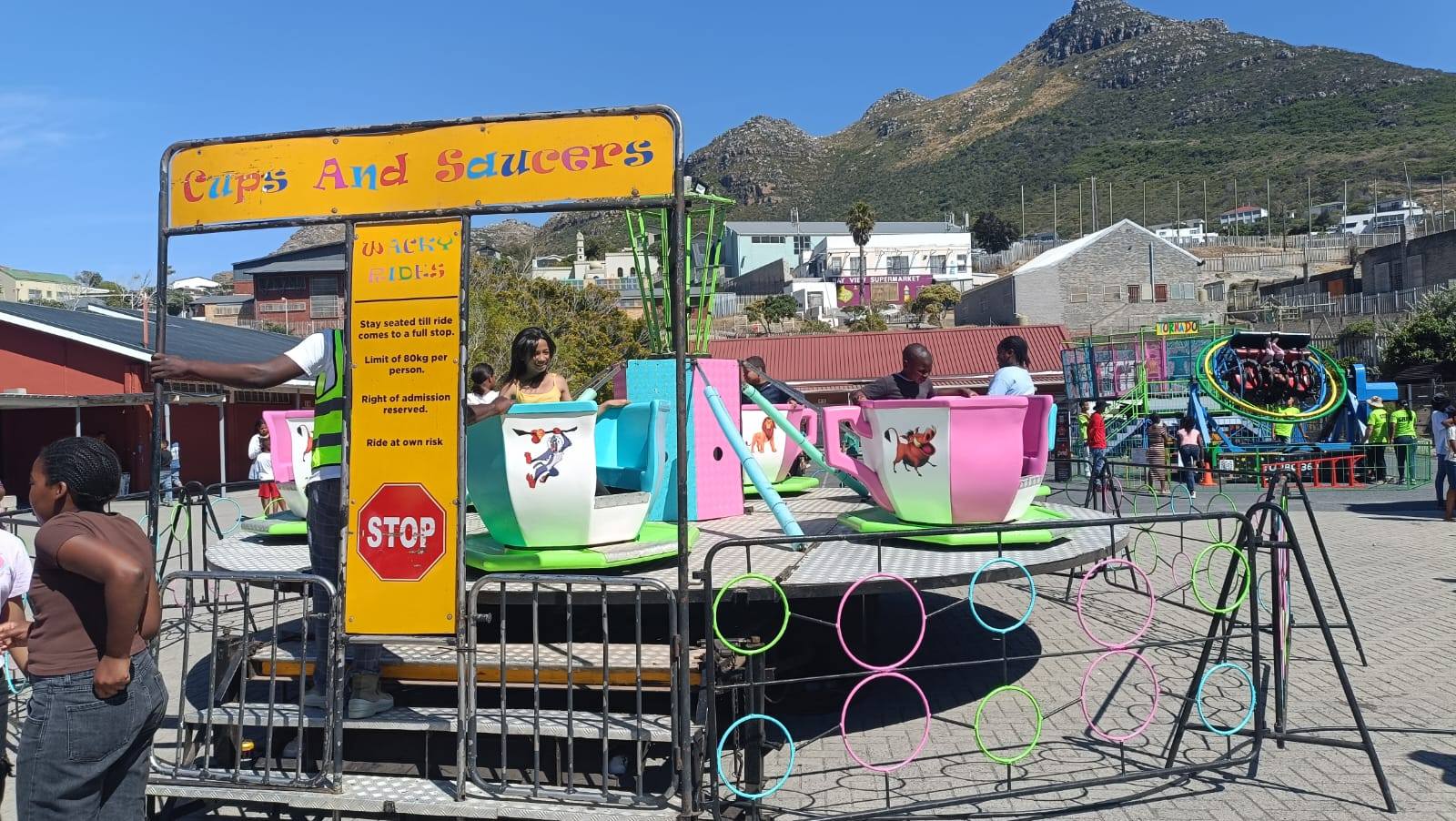 Cup and Saucers amusement ride setup at an event