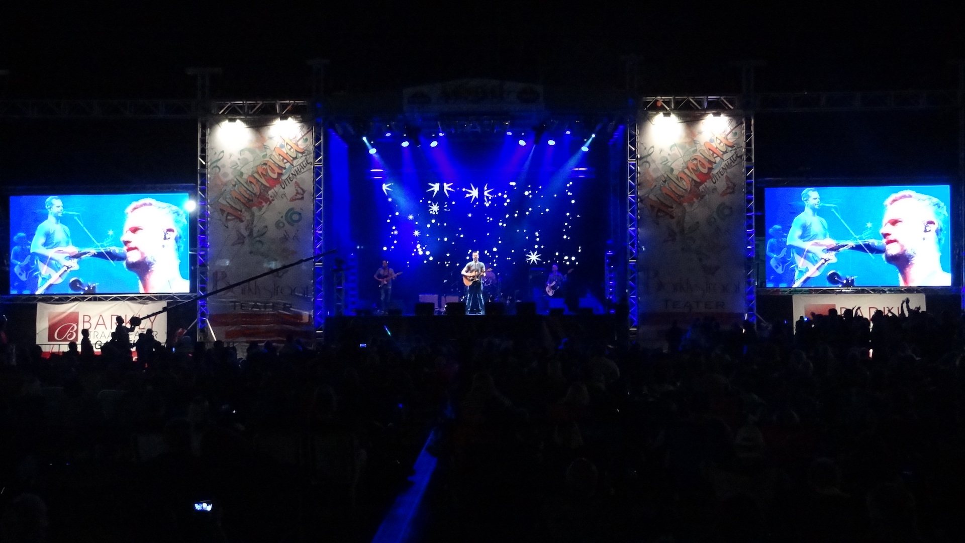 Live performance stage with speakers and LED screens