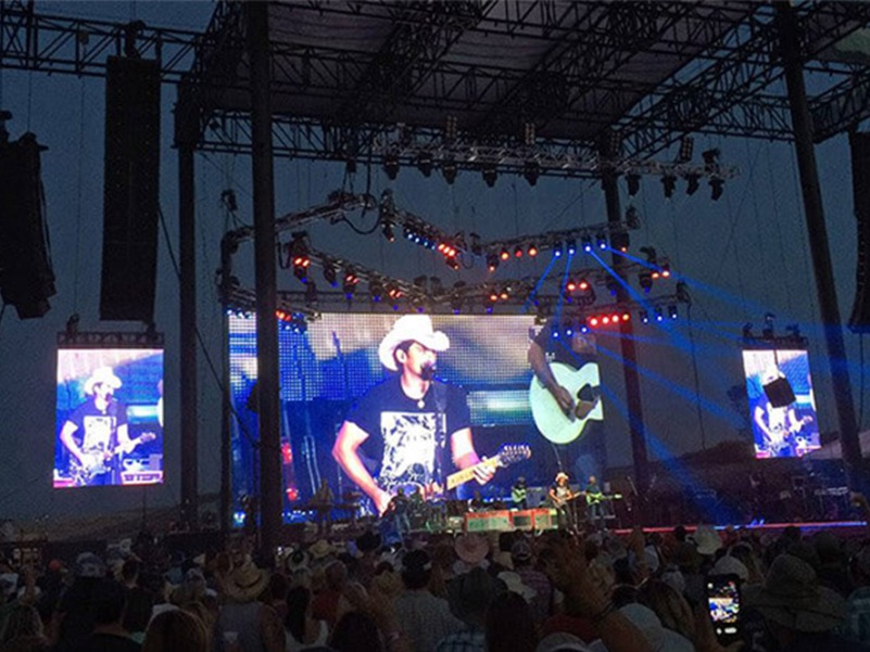 Large LED screens set up on a stage for a live performance.