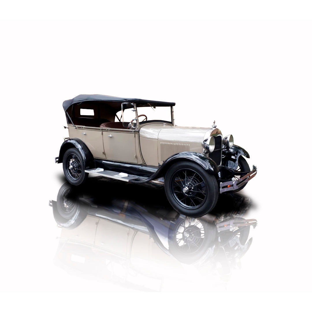 A vintage classic car with a soft top and elegant design.