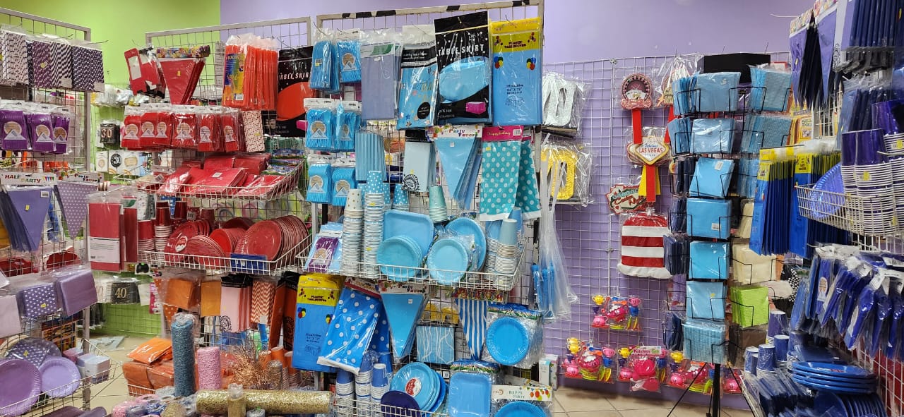 Variety of party supplies displayed in a shop