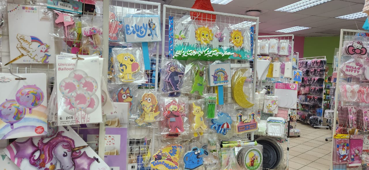 Display of colorful party supplies and decorations in a store