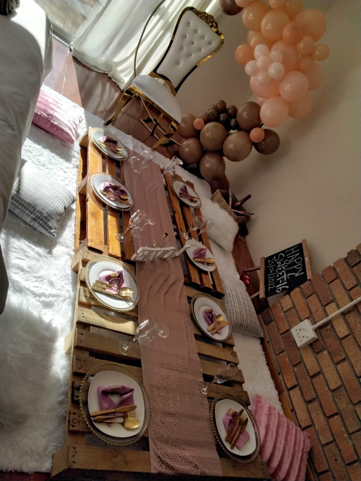 Stylish picnic table setup with plates and decorations