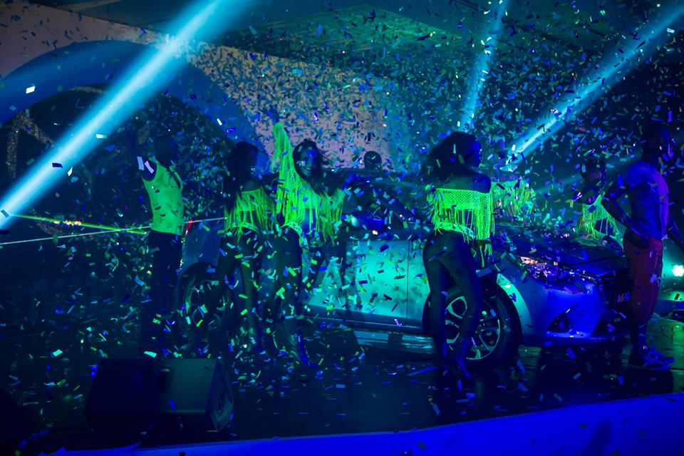 Colorful confetti falling during an event performance.