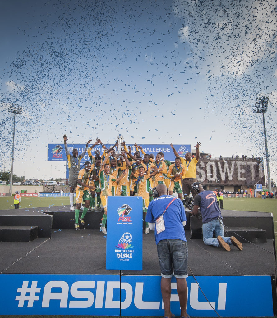 Winning team celebrating with confetti shower